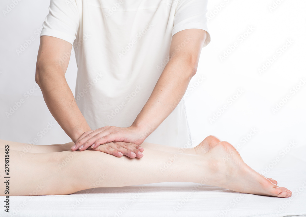 Close-up of female hands doing foot massage