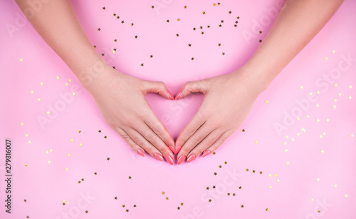 Wallpaper Mural Woman's hand with Pink manicure making heart. Torontodigital.ca