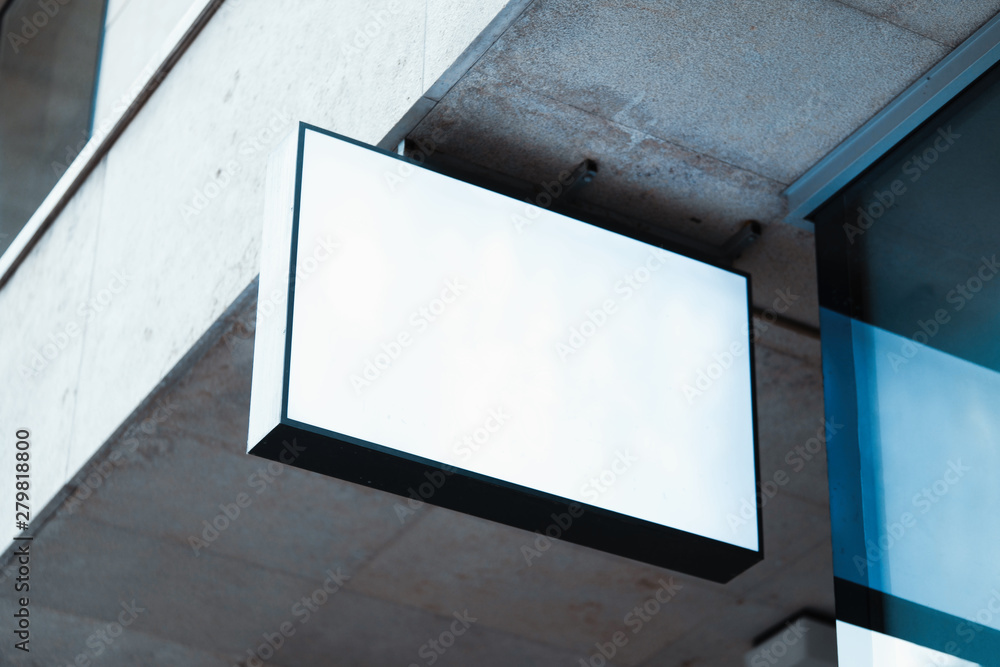 Blank store signboard mockup. Empty shop signage template mounted on