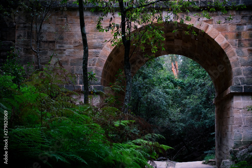 old stone bridge in the forest