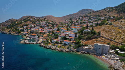 Aerial drone photo of small picturesque seaside fishing village of Kamini in picturesque island of Ydra or Hydra, Saronic gulf, Greece