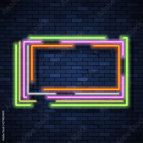 Glowing neon frame on brick wall background