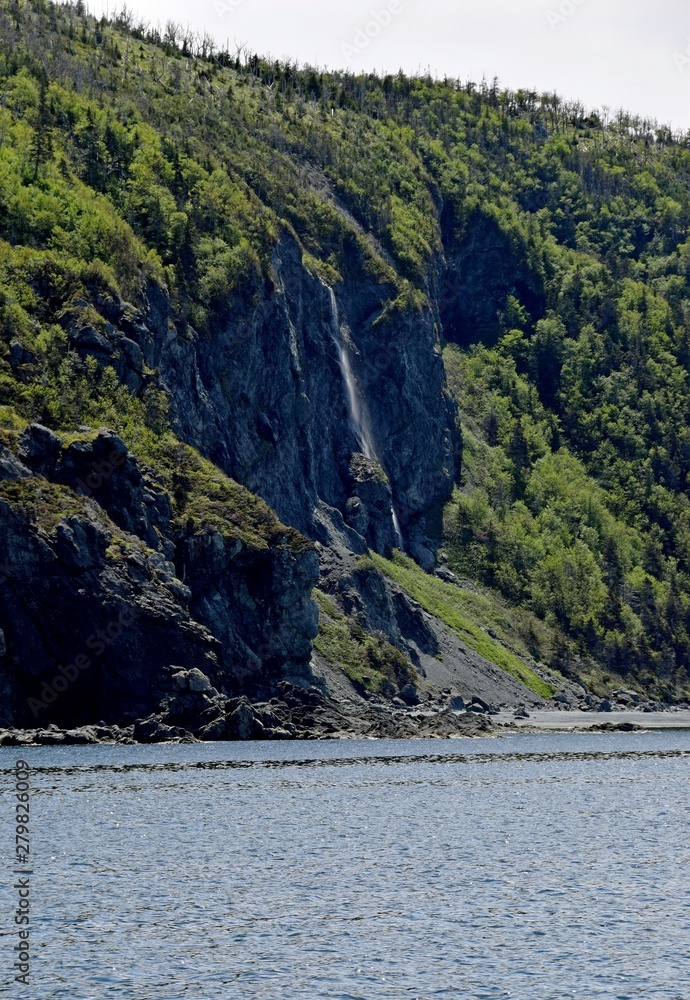 shoreline along the Bonne Bay; towards the Lookout Hills waterfall in the Gros Morne National Park along the Viking trail; Newfoundland and Labrador Canada shoreline along the Bonne Bay; towards the Lookout Hills waterfall in the Gros Morne National Park along the Viking trail; Newfoundland and Labrador Canada