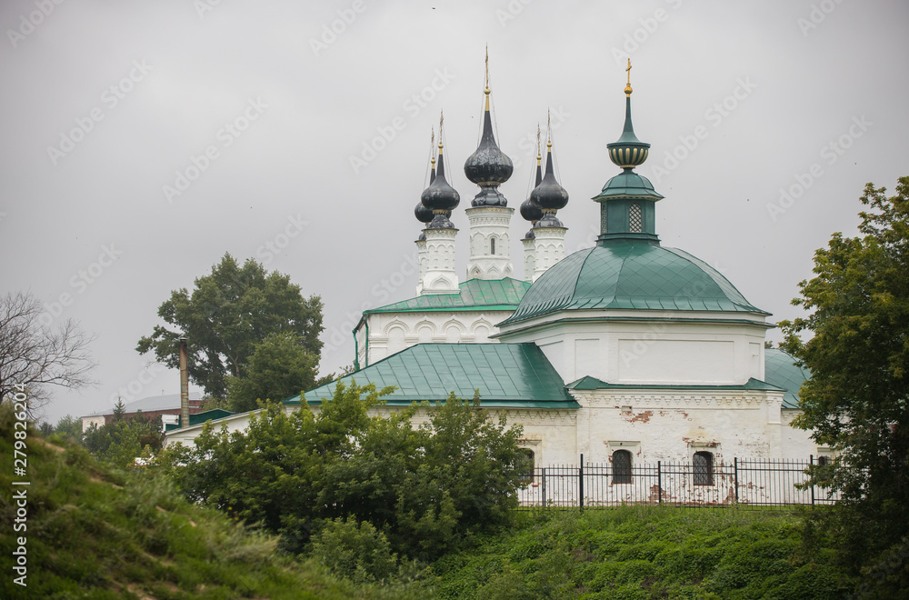 Big Christian church with blue domes in the village - Suzdal, Russia