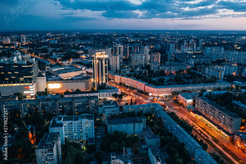 Aerial view of night European city Voronezh midtown or center panorama with modern buildings, drone shot from above