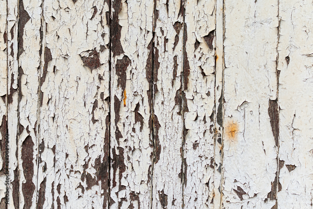 old planks whose white paint falls off old planks whose white paint falls off