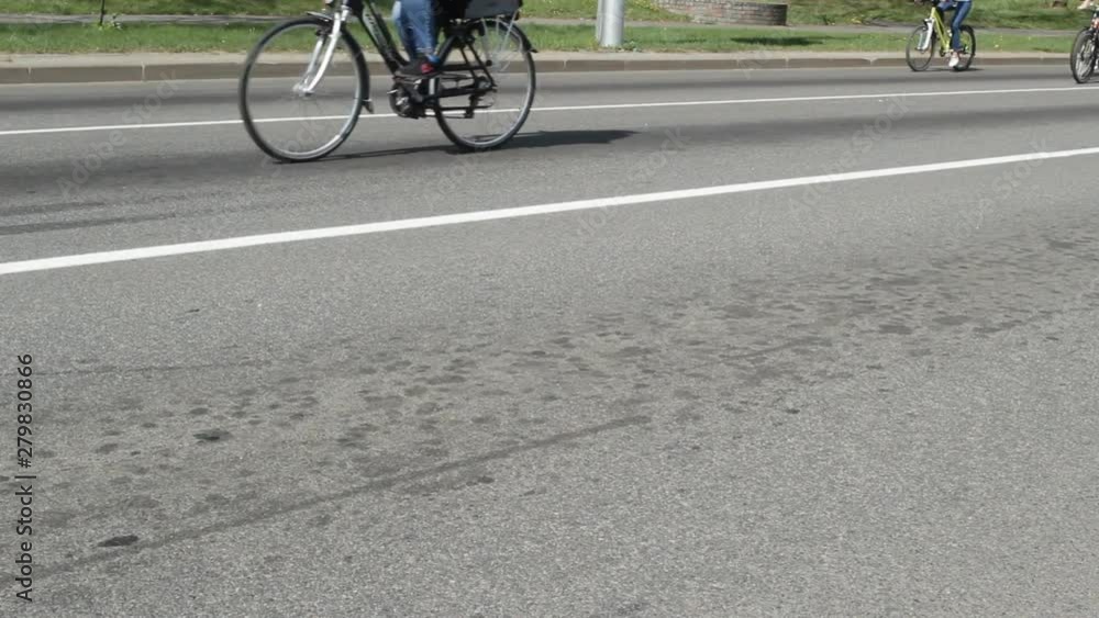 Many people ride bicycles in the city for a bike ride, background, summer, healthy lifestyle, sports Many people ride bicycles in the city for a bike ride, background, summer, healthy lifestyle, sports