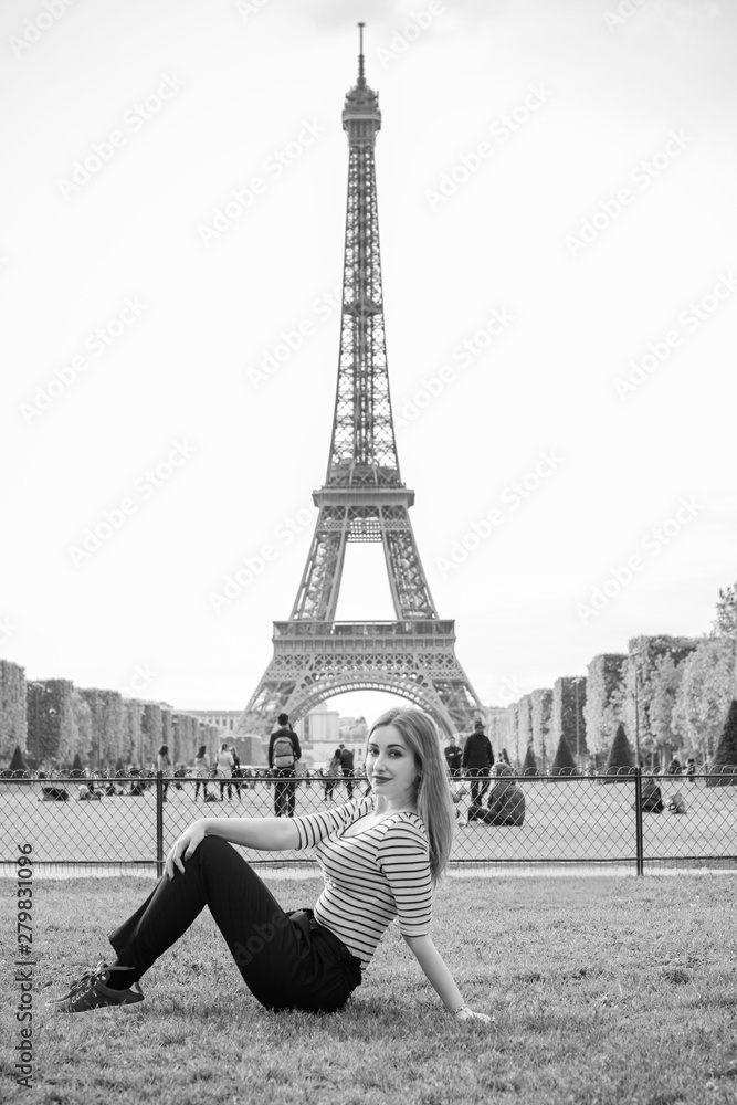 Holidays in Paris, France. Fashionable pretty woman rest in centre of city, concept of vacation. Lady in romantic look at street 