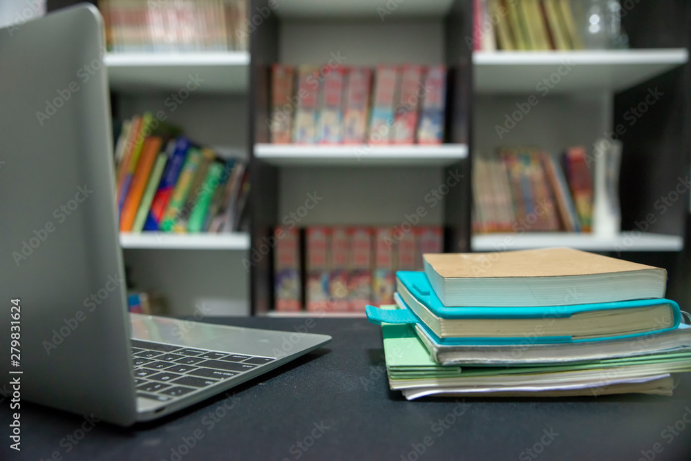 Diary and book on School table for student,study for exam.Wooden desk with desktop laptop,notebook,book and diary at library.Desk for student concept. Diary and book on School table for student,study for exam.Wooden desk with desktop laptop,notebook,book and diary at library.Desk for student concept.