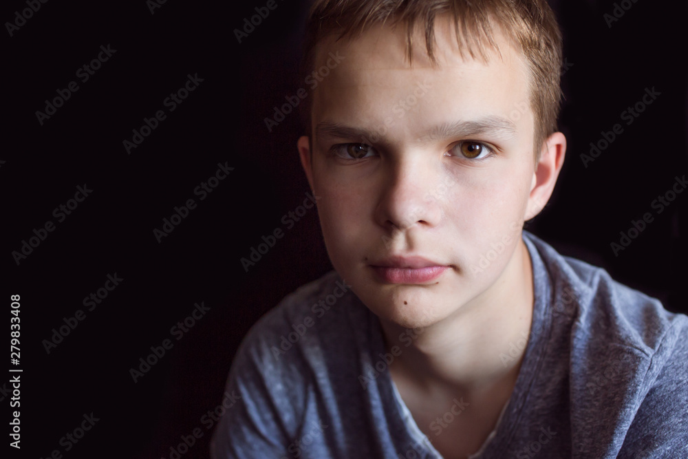 Portrait of a sad, tired, depressed teenager. Problems of teenagers, concept Portrait of a sad, tired, depressed teenager. Problems of teenagers, concept