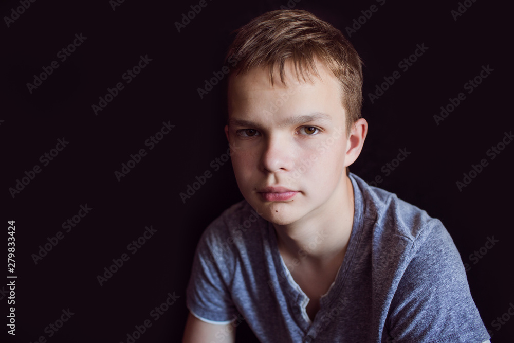 Portrait of a sad, tired, depressed teenager. Problems of teenagers, concept