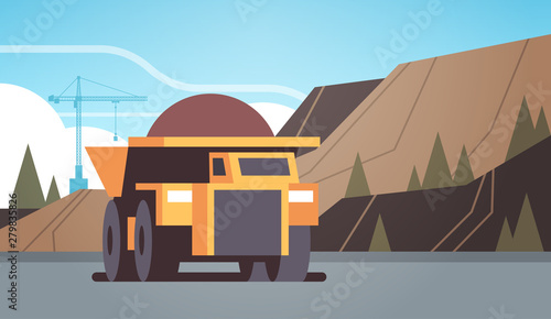 heavy yellow dumper truck professional equipment working on coal mine production mining transport concept opencast stone quarry background flat horizontal