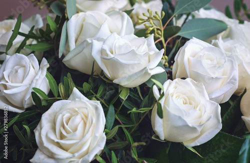 Delicate  white roses. Beautiful  fresh flowers  a festive bouquet. Floral background.