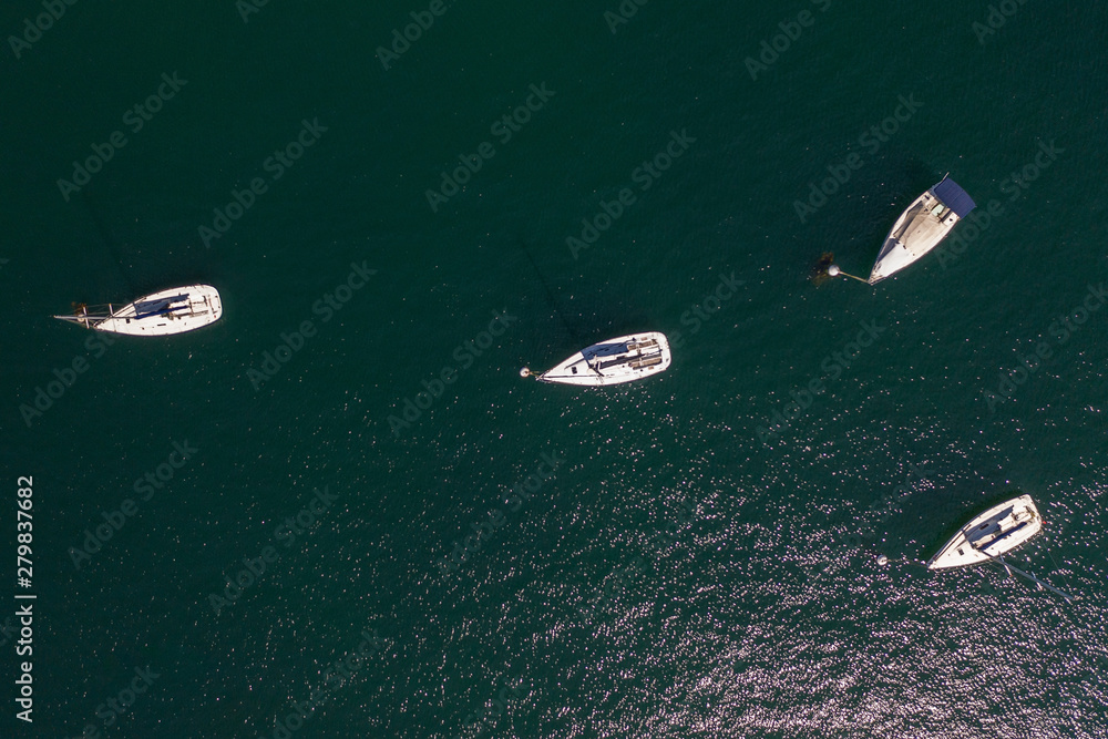 white sailing yachts in the sea top view white sailing yachts in the sea top view