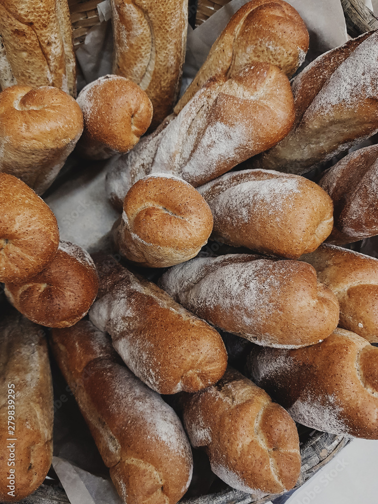Background of fresh french baguettes in bakery