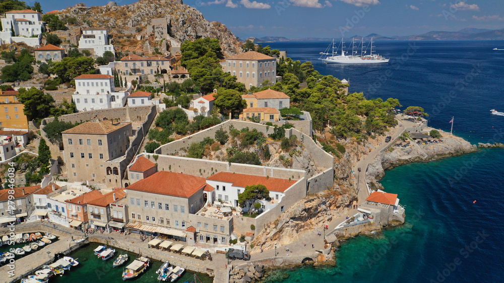 Aerial drone panoramic photo of picturesque port and main village of Hydra or Ydra island with beautiful neoclassic houses, Saronic gulf, Greece