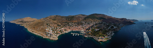 Fototapeta Naklejka Na Ścianę i Meble -  Aerial drone panoramic photo of picturesque port and main village of Hydra or Ydra island with beautiful neoclassic houses, Saronic gulf, Greece
