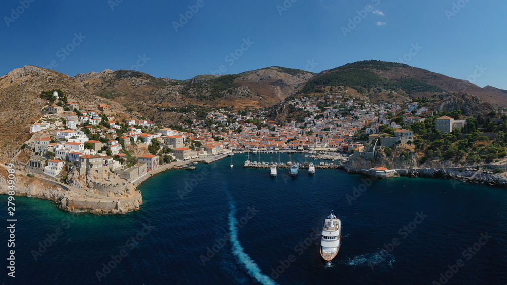 Aerial drone photo of picturesque port and main village of Hydra or Ydra island with beautiful neoclassic houses, Saronic gulf, Greece