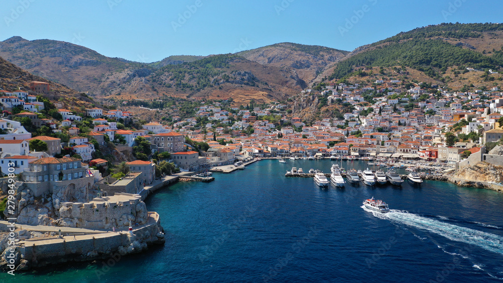 Aerial drone photo of picturesque port and main village of Hydra or Ydra island with beautiful neoclassic houses, Saronic gulf, Greece