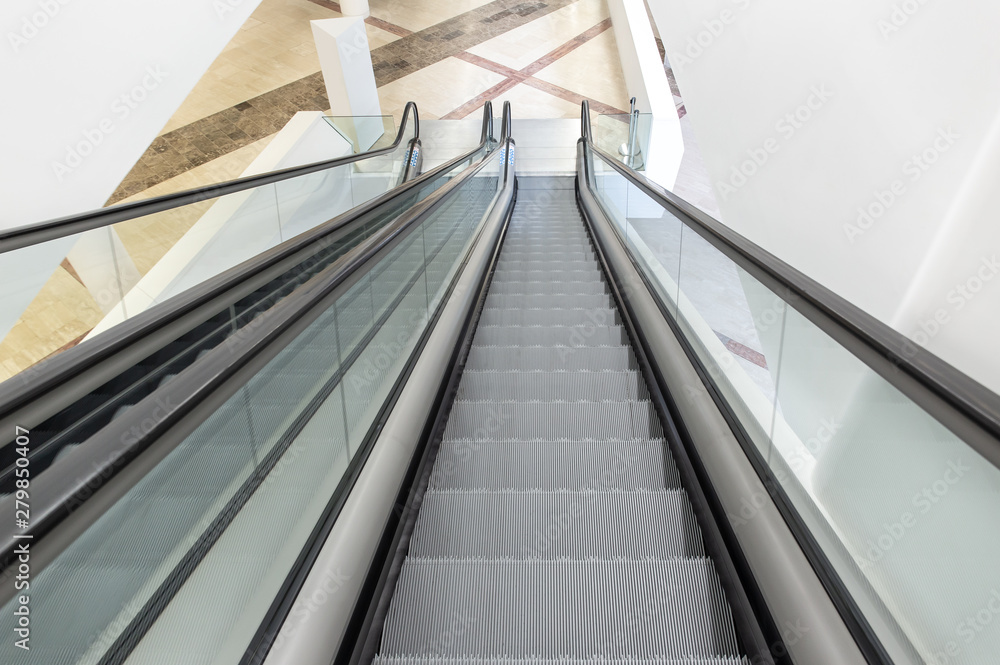 Modern luxury escalators on indoor building Modern luxury escalators on indoor building