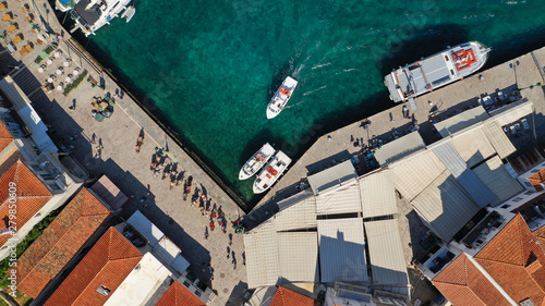 Aerial drone photo of picturesque port and main village of Hydra or Ydra island with beautiful neoclassic houses, Saronic gulf, Greece photo