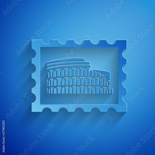 Paper cut Postal stamp and Coliseum icon isolated on blue background. Colosseum sign. Symbol of Ancient Rome, gladiator fights. Paper art style. Vector Illustration