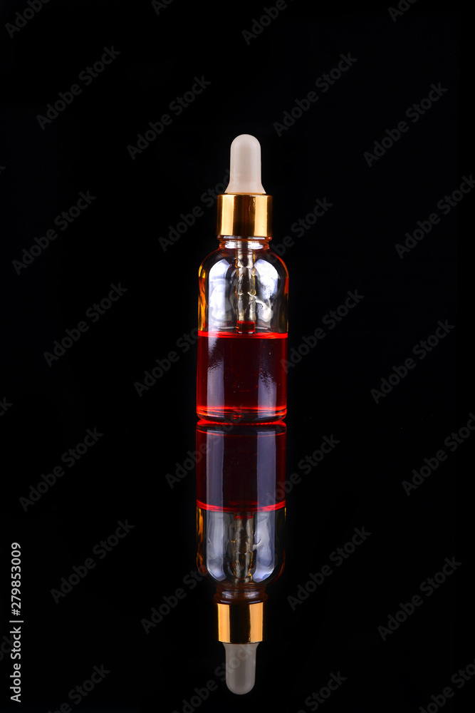 Electronic cigarette liquid flavour isolate on black Electronic cigarette liquid flavour isolate on black