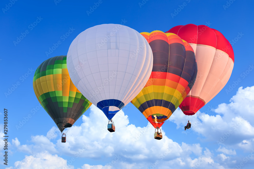Fototapeta premium Colorful Hot Air Balloons in Flight over blue sky