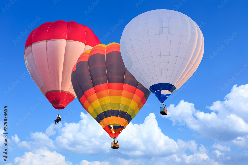 Naklejka premium Colorful Hot Air Balloons in Flight over blue sky