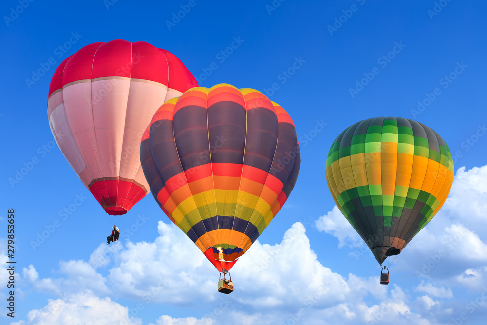 Fototapeta premium Colorful Hot Air Balloons in Flight over blue sky