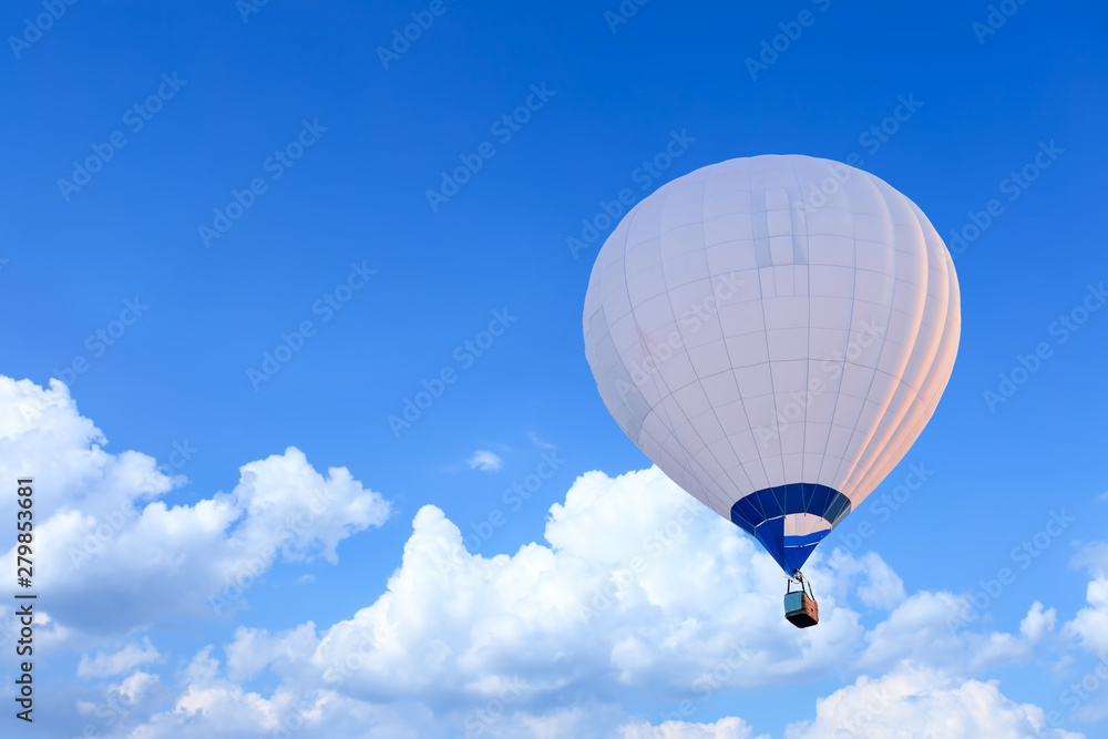 Obraz premium Colorful Hot Air Balloons in Flight over blue sky