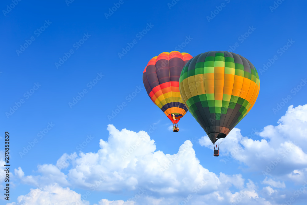 Colorful Hot Air Balloons in Flight over blue sky Colorful Hot Air Balloons in Flight over blue sky
