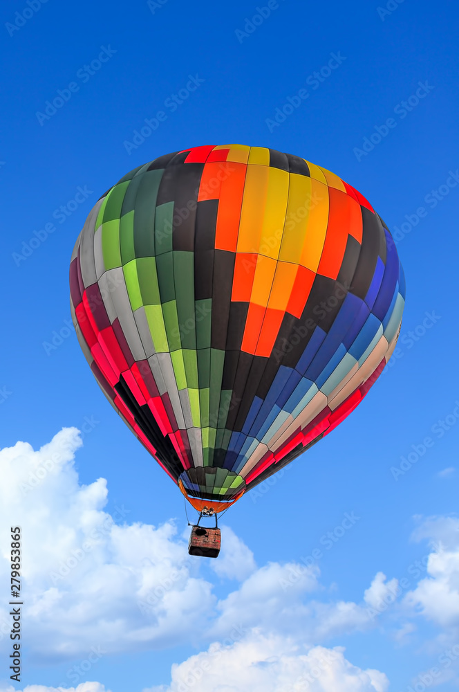Fototapeta premium Colorful Hot Air Balloons in Flight over blue sky