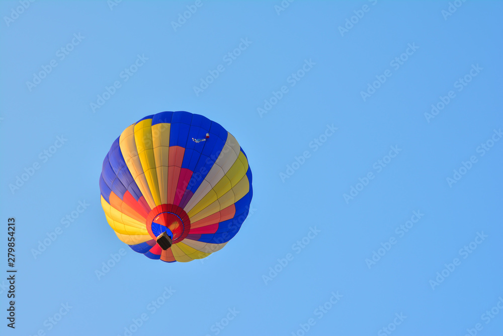 Fototapeta premium Colorful Hot Air Balloons in Flight over blue sky