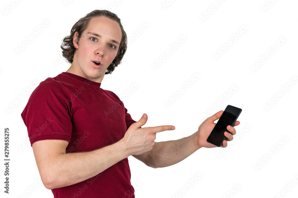 Handsome young man in t-shirt holding blank screen smartphone over white background Handsome young man in t-shirt holding blank screen smartphone over white background