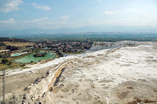 white calcium mountain with granite with small waterfall in summer in Pamukkale