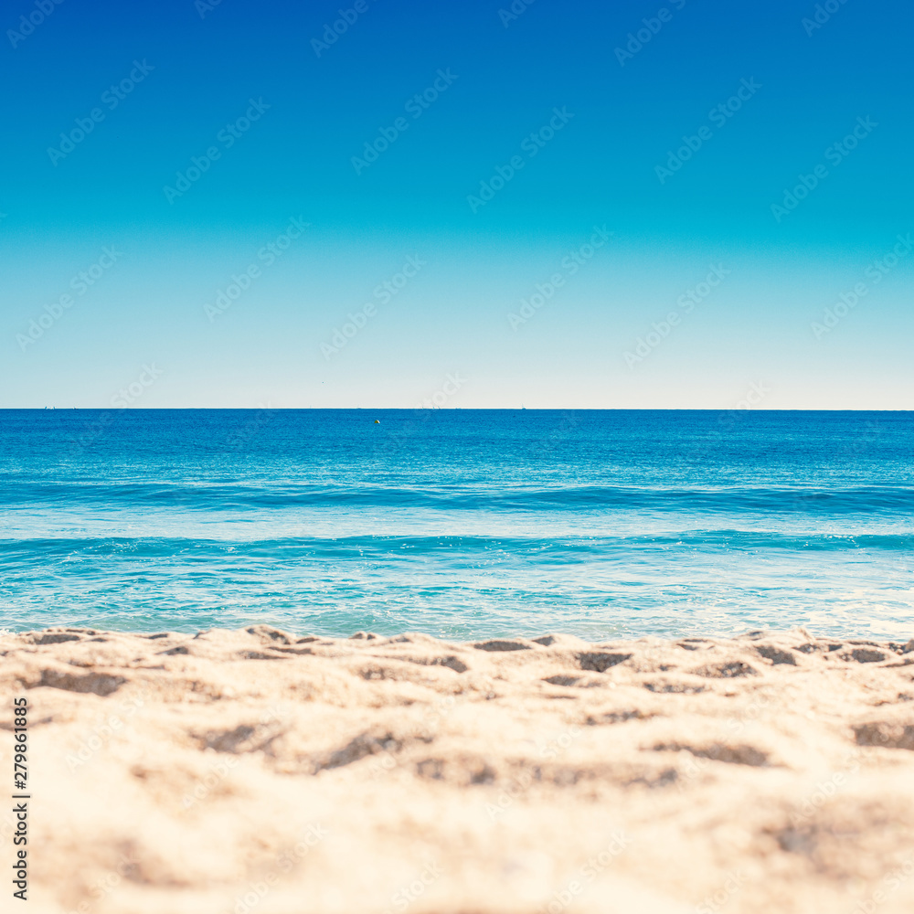 Blue ocean wave on sandy beach. Summer Vacation concept .