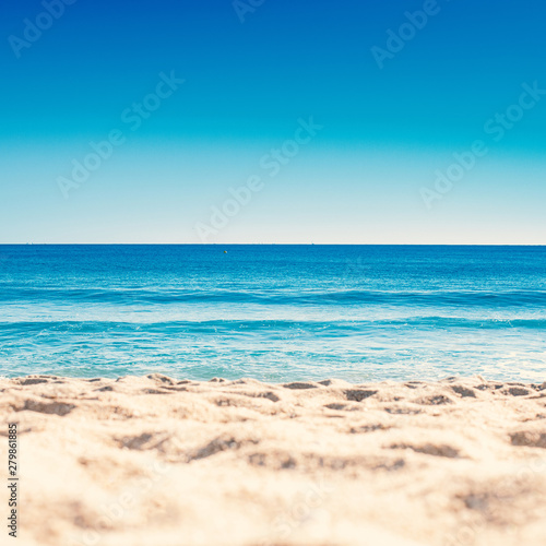 Blue ocean wave on sandy beach. Summer Vacation concept . © nataliazakharova