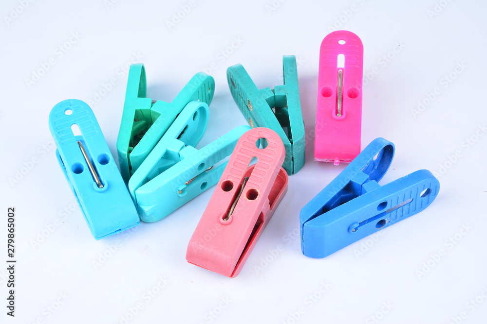 Clothes-peg collection. Set of plastic colorful clothespin isolated on white background Clothes-peg collection. Set of plastic colorful clothespin isolated on white background