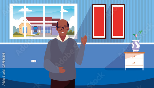 grandpa standing in the living room home