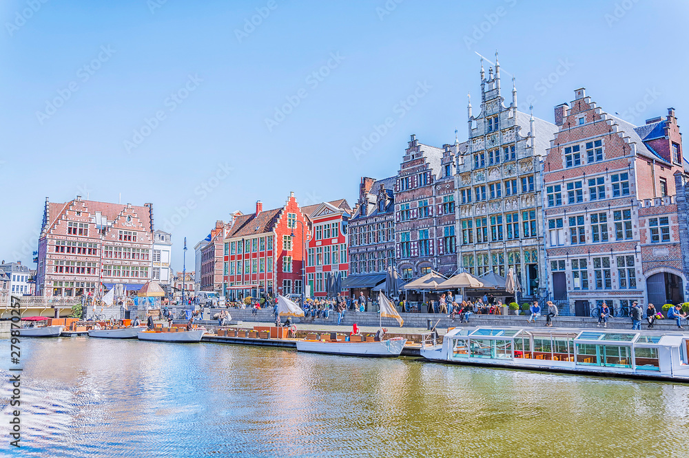 Picturesque medieval houses and buildings on the river in city Ghent, Belgium