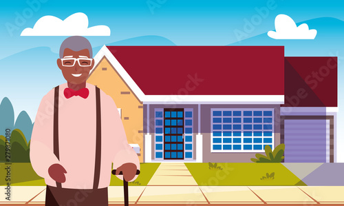 old man standing next house exterior