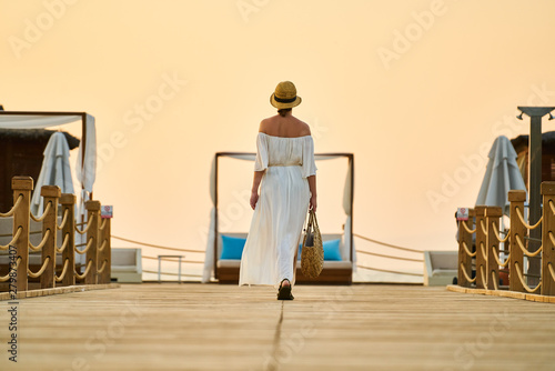 Romantic sunset and alone woman