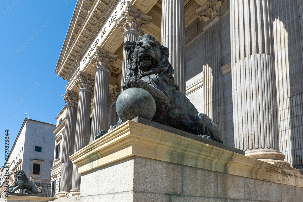 Lion statue at the entrance of the Spanish Parliament (Congreso de los Diputados), Madrid, Spain