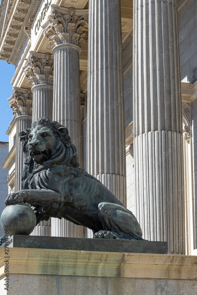 Lion statue at the entrance of the Spanish Parliament (Congreso de los Diputados), Madrid, Spain