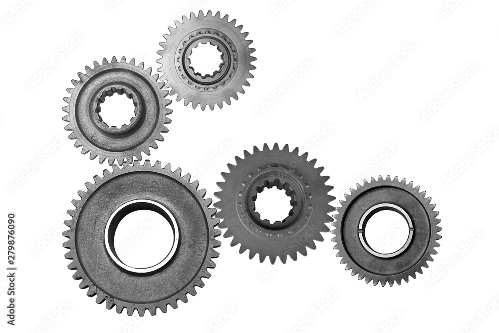 Interlocking metal gears isolated on a white background. Cogwheel industrial background.