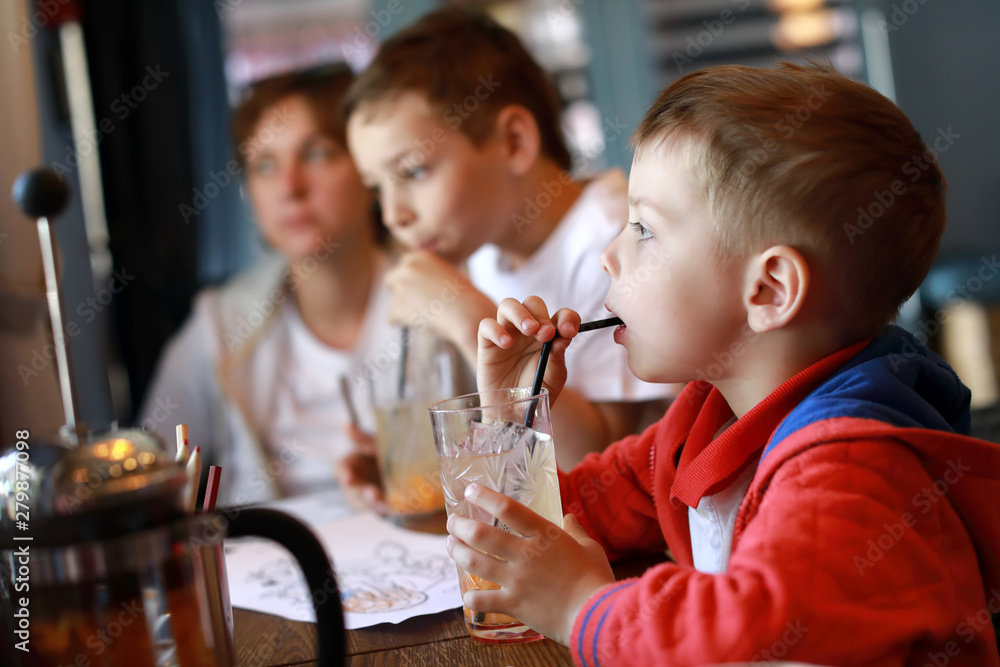 Boys drinking lemonade