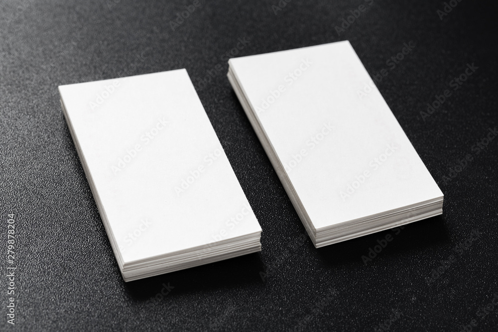 Mockup of business cards stack at dark background. Design concept. Template for branding identity. Mockup of business cards stack at dark background. Design concept. Template for branding identity.