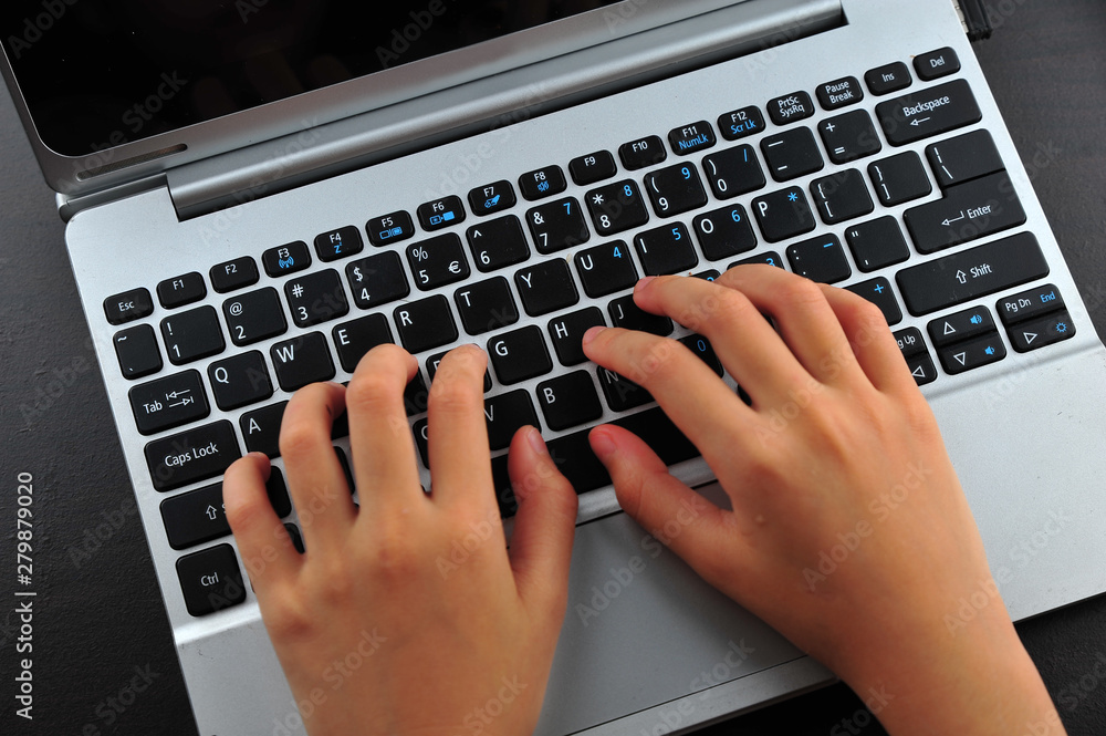 Close-up of typing female hands on keyboard Close-up of typing female hands on keyboard