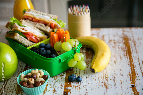 Back to school concept - packed school lunch on kitchen background, copy space photo